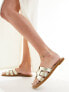 schuh Tierney flat sandals in gold leather