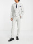 Фото #4 товара ASOS DESIGN skinny wool mix trousers in basketweave texture ice grey