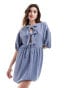 Фото #1 товара ASOS DESIGN puff sleeve tie front mini dress in denim blue