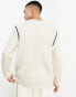 ASOS DESIGN long sleeve relaxed t-shirt with taping detail in cream