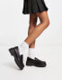 Truffle Collection chunky fringe loafers in black