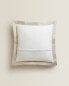 Textured cushion cover with linen border