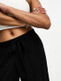 Фото #4 товара ASOS DESIGN Petite tie belt wide leg trouser culottes in black