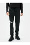 Фото #3 товара Спортивные брюки Koton Jogger с принтом и карманами