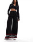 ellesse Tricia wide leg track pants in black