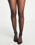 Фото #1 товара ASOS DESIGN medium polka dot tights in black