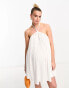 The Frolic Maternity sunstone halter volume mini summer dress in white waffle