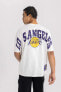 Фото #1 товара DeFactoFit NBA Los Angeles Lakers Oversize Fit Bisiklet Yaka Kısa Kollu Tişört