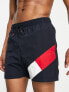 Tommy Hilfiger flag leg logo mid length swim shorts in navy