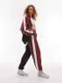 Фото #1 товара Topshop co-ord sporty shell cuffed tracksuit bottoms in burgundy