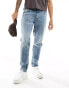 Фото #11 товара ASOS DESIGN stretch tapered jeans in dark wash blue