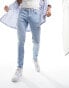 Фото #3 товара ASOS DESIGN skinny jeans in light wash blue with thigh rip