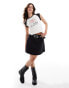 Фото #1 товара Levi's mini flounce denim skirt in washed black