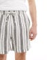 Фото #5 товара ASOS DESIGN shorter length short in green striped linen