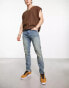 Фото #4 товара ASOS DESIGN skinny jeans with stitch detail in y2k light wash blue