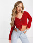 ASOS DESIGN knitted top in rib with ruched front in red