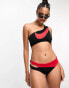 Фото #1 товара Nike Swimming Icon Sneakerkini asymmetrical bikini bottoms in black and red