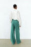 Loose-fitting darted trousers