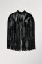 Short leather cape with fringing