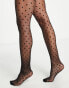 ASOS DESIGN medium polka dot tights in black