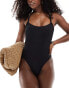 In The Style x Perrie Sian textured tie back swimsuit with pearl strap detail in black