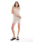 Фото #2 товара ASOS DESIGN holiday knitted halter mini dress with 3D flowers in cream