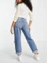 ASOS DESIGN Petite high waist 'slouchy' mom jeans in stonewash with rips