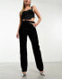 ASOS DESIGN mid rise straight jean with cut out waistband in washed black