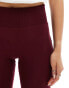 Bershka high waisted sculpting jersey flared trousers in burgundy