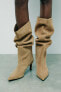 SPLIT SUEDE HEELED BOOTS