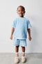 Plush t-shirt and waffle-knit bermuda shorts co-ord