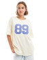 ASOS DESIGN oversized t-shirt with denim applique sporty tee in white