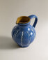 Striped ceramic milk jug