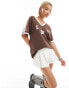 Lioness v neck sports jersey top in brown with white contrast trims