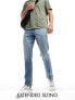 Фото #1 товара ASOS DESIGN stretch slim jeans in light blue wash