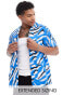 ASOS DESIGN relaxed revere shirt with animal print in blue