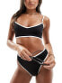 Фото #1 товара ASOS DESIGN mix and match contrast binding hidden underwire crop bikini in black