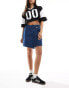 JDY high waist asymetric denim skirt in mid blue