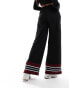 Фото #4 товара ellesse Tricia wide leg track pants in black