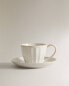 Фото #1 товара Stoneware teacup and saucer with raised design