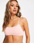 Фото #1 товара Nike Swimming Racerback bikini top in light pink