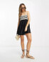 Фото #1 товара ASOS DESIGN crochet mini sundress in mono