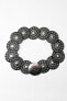 STUDDED LEATHER CIRCLE BELT