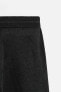 CREASED-EFFECT KNIT TROUSERS