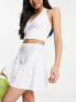 Фото #1 товара ASOS DESIGN flippy broderie mini skirt in white