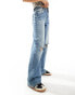 Bershka ripped knee wide leg jeans in mid wash