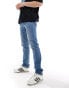 Фото #1 товара Levi's 511 slim fit performance cool denim jeans in mid blue