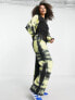 Фото #4 товара ASOS DESIGN oversized jogger with neon tiedye side detail in black