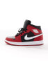 Air Jordan 1 mid trainers in black and red