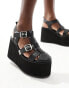 Koi Soulcraft mega platform sandals in black